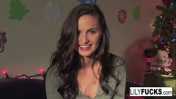 New Lily tells us her horny Christmas wishes before satisfying herself in both holes power Tube